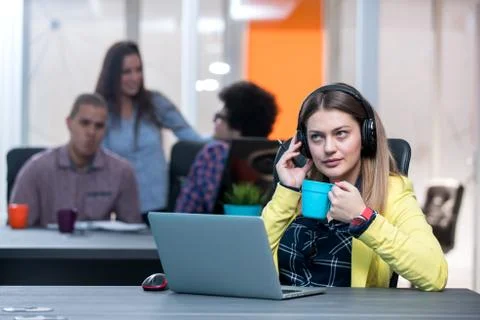 Young start up team disccusing projects Stock Photos