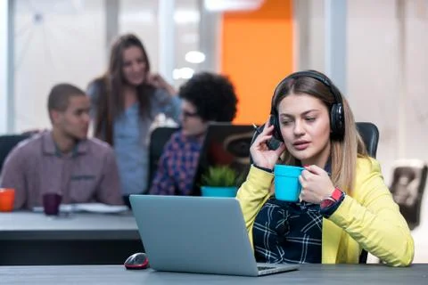 Young start up team disccusing projects Stock Photos