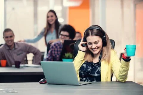 Young start up team disccusing projects Stock Photos