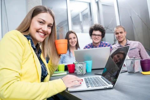 Young start up team disccusing projects Stock Photos