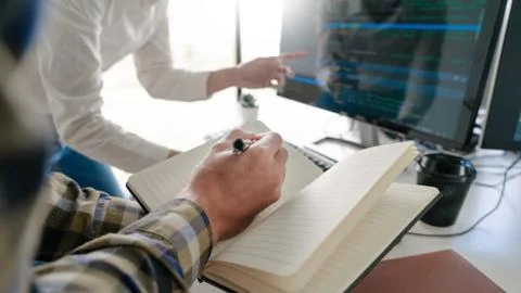 Young startup Programmers Sitting At Desks Working On Computers screen for De 스톡 사진