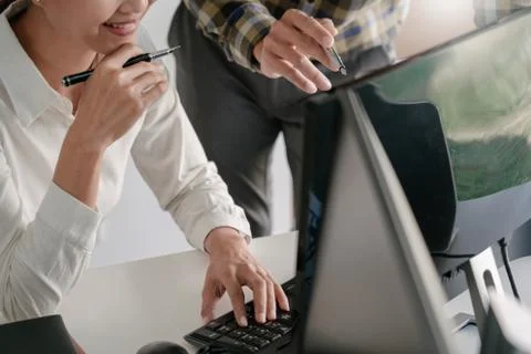 Young startup Programmers Sitting At Desks Working On Computers screen for De 스톡 사진
