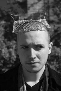 Young with strainer Metallic Hat 스톡 사진