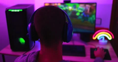 Young streamer gamer playing at strategy game in broadcast browser Видео 145432149