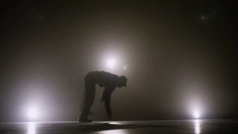 Young street dancer boy dancing on a talent show competition stage to become  Stock Footage 88631205