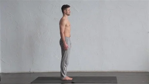 A young strong man doing yoga exercises. Studio shot Stock Footage 71240394