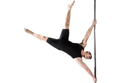 Young strong pole dancer smiling man in black clothes on pylon. White backgro Stock Photos