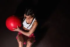 Athletic man exercising with a heavy kettlebell for cross-fit