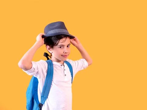 Young Student with Backpack on Orange Background Stock Photos