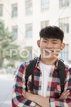Young student with backpack, portrait Stock Photos