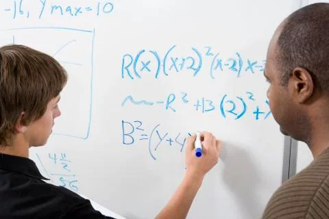 Young Student Doing Math Sums Foto stock