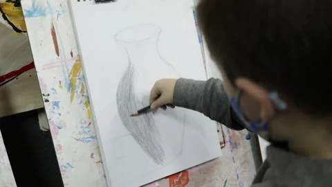 Young student drawing in class Stock Footage 152722820