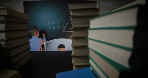 A young student draws on the board Stock Footage 86555798