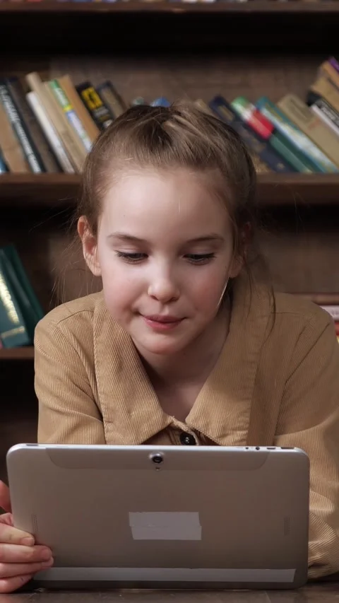 Young student girl using digital tablet for remote learning and online education Stock Footage 341440611