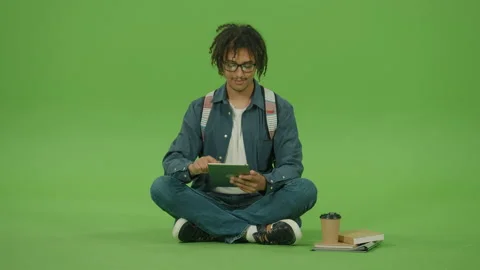 Young Student in Glasses with Street Backpack and Denim Shirt Looking to Tablet Video stock 219729877
