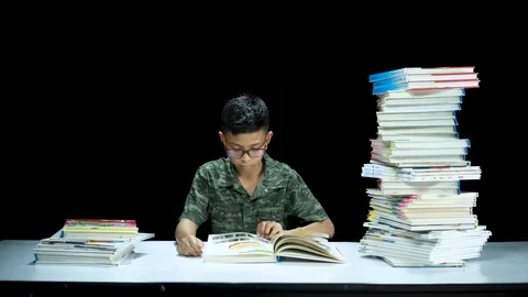 Young student in the library Stock Footage 126145441