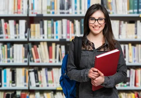 Young student in a library Stock Photos