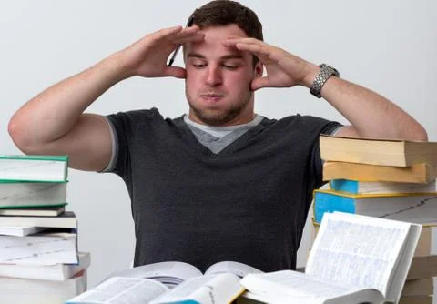 Young student overwhelmed with studying Foto stock