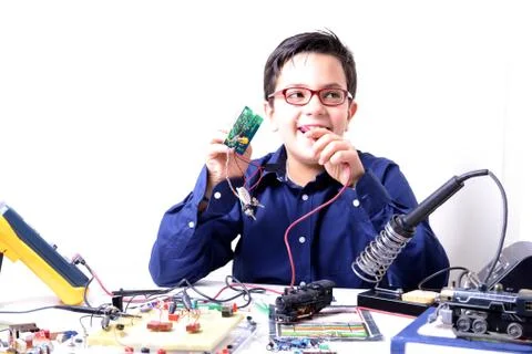 Young student performs experiments 写真素材