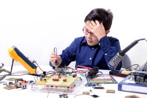 Young student performs experiments Stock Photos