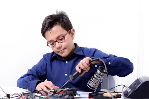 Young student performs experiments Stock Photos