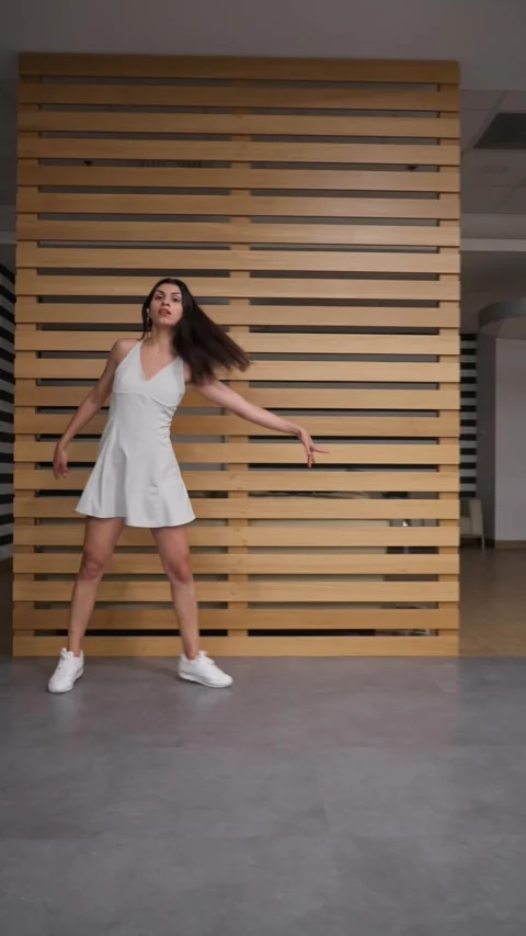 Young student practicing contemporary dance choreography during a class lesson Stock Footage 312515222