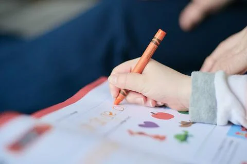 Young student practicing her writing skills Stockfoto's