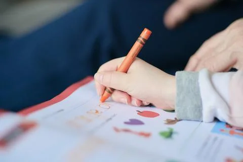 Young student practicing her writing skills Stock Photos
