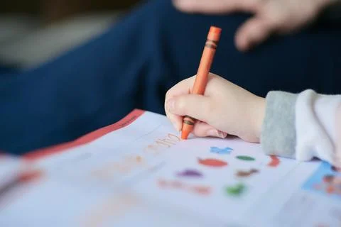 Young student practicing her writing skills Stock Photos