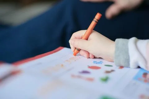 Young student practicing her writing skills Stock Photos