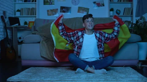 Young student with Spanish flag supporting national team, football championship Stock Footage 101719476