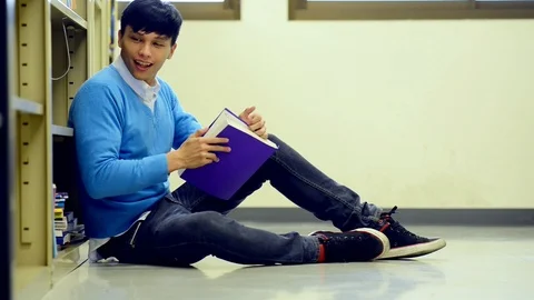 Young student study hard in library. Stock Footage 85655972