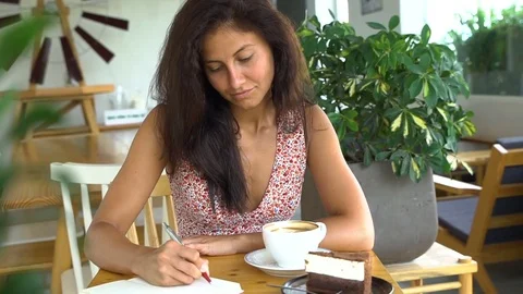 Young student studying and drink coffee Stock Footage 77560139