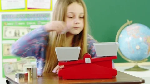 Young student studying weights Stock Footage 80131552