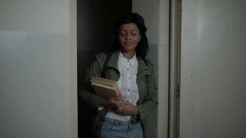 Young student in university going to class Stock Footage 101374144