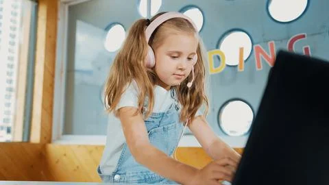 Young student working on laptop or studying in online classroom. Erudition. 스톡 사진