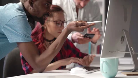 Young students are developing a new project Stock Footage 160556798