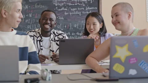 Young Students Chatting and Smiling on Programming Class Stock Footage 257067899