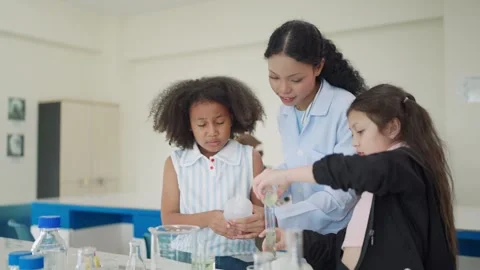 Young students girls in a lab setting Stock Footage 340448630