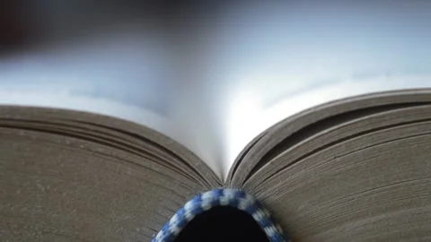 Young student's hand turning page of an english dictionary for knowledge Video stock 204779332
