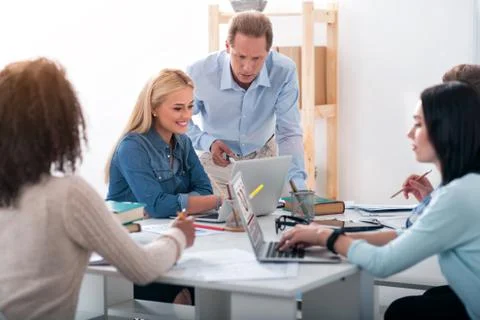 Young students learning with the help of computer Stock Photos
