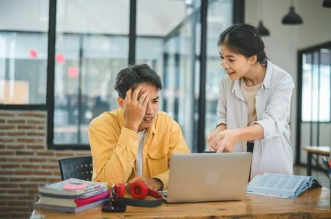 Young students quarrel when their work fails and goals are not met. , commu.. Stock Photos