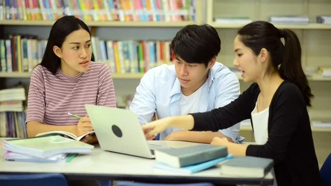 Young students study hard in library. Stock Footage 85669223