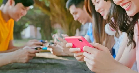 Young students use smartphone Stock Footage 127017587