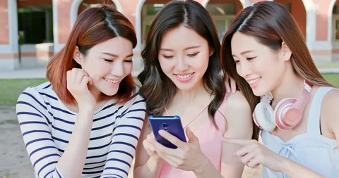 Young students use smartphone Stock Footage 127021174