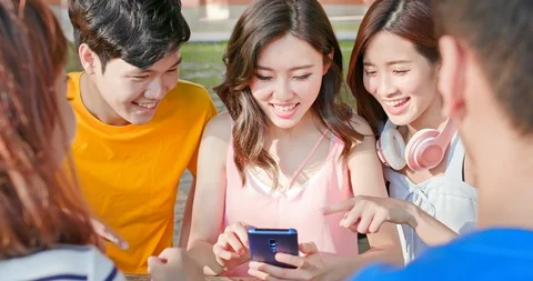 Young students use smartphone Stock Footage 127055515