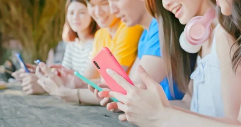 Young students use smartphone Stock Footage 128161983