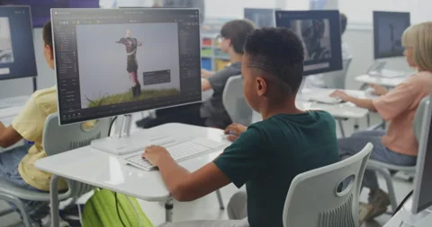 Young Students Using Computers, Creating Game Characters in Design Software Stock Footage 316291211