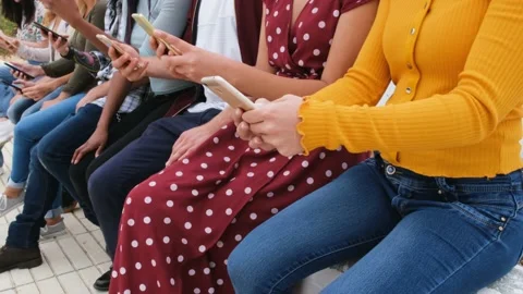 Young students using smartphones - People addiction to new technology Stock Footage 137440776