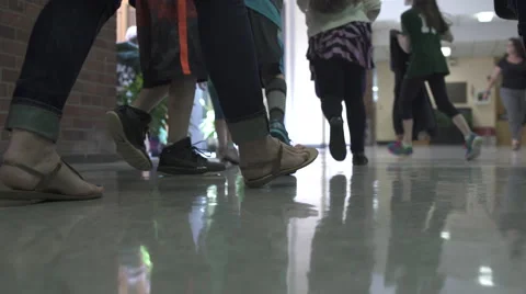 Young students walking being evacuated out of school Stock Footage 50418507